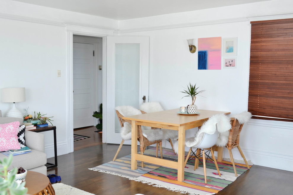 Inspiration for a small eclectic dark wood floor great room remodel in San Francisco with white walls