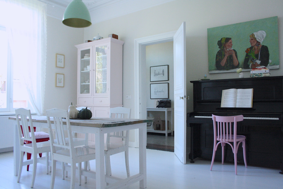 Example of a cottage chic dining room design in Amsterdam