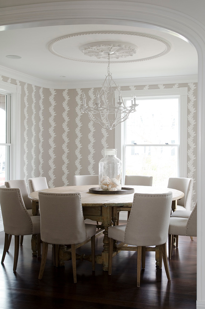 Inspiration for a coastal dining room in New York with multi-coloured walls and dark hardwood flooring.
