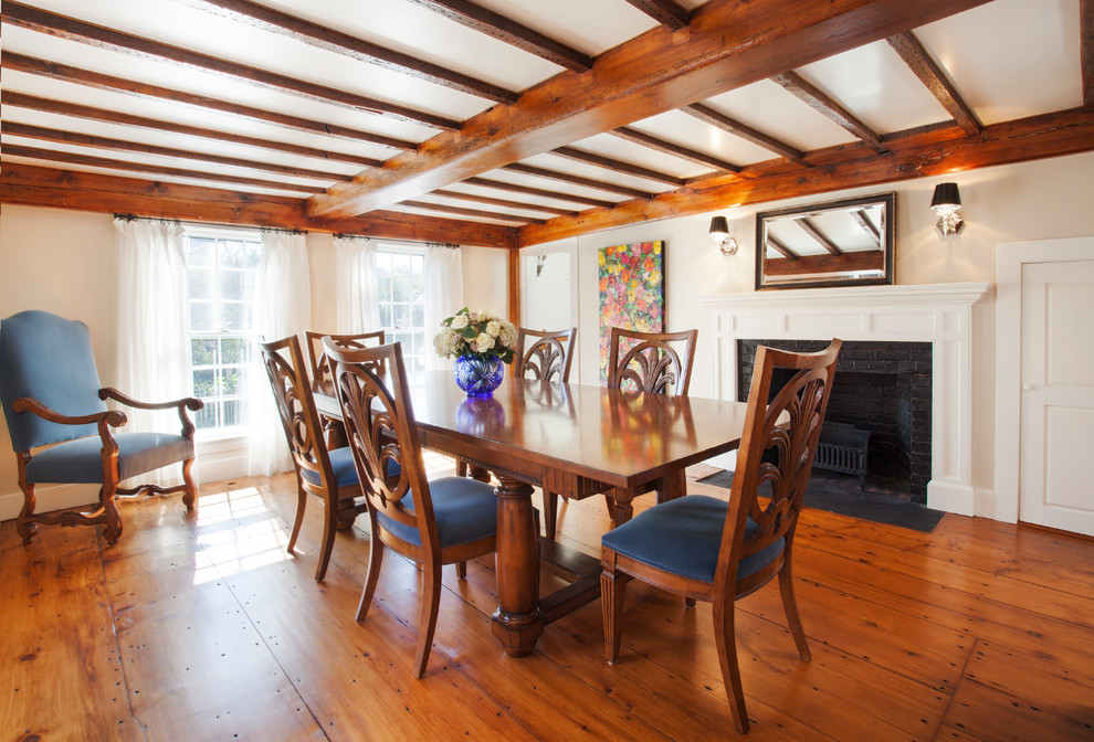 This is an example of a beach style dining room in Boston.