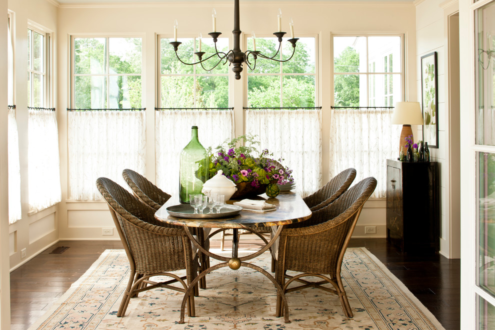 Photo of a large country enclosed dining room in Nashville with white walls, dark hardwood flooring and feature lighting.