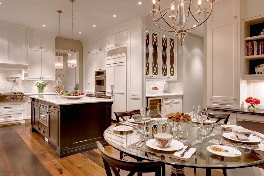 Inspiration for a medium sized classic kitchen/dining room in Toronto with white walls, medium hardwood flooring and no fireplace.