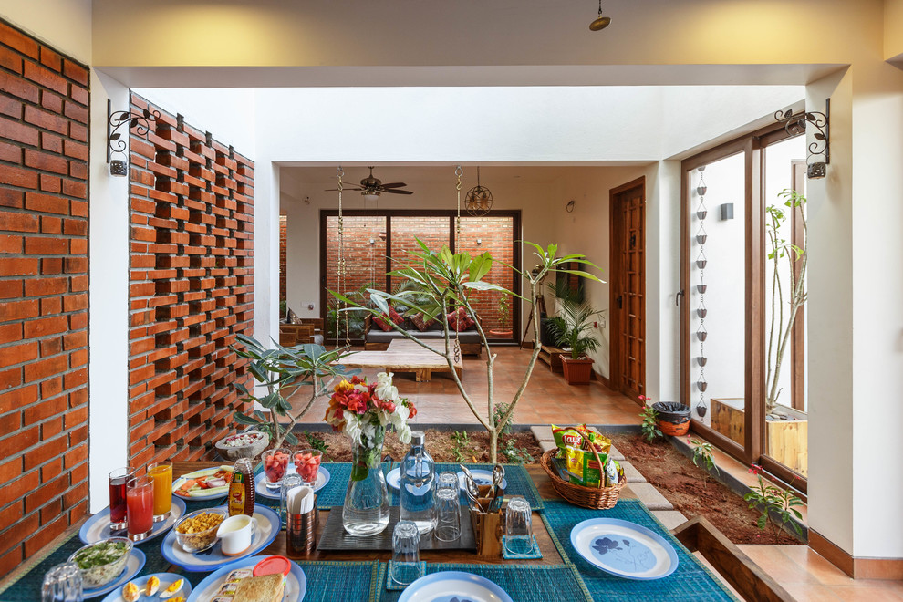 This is an example of a world-inspired dining room in Bengaluru.