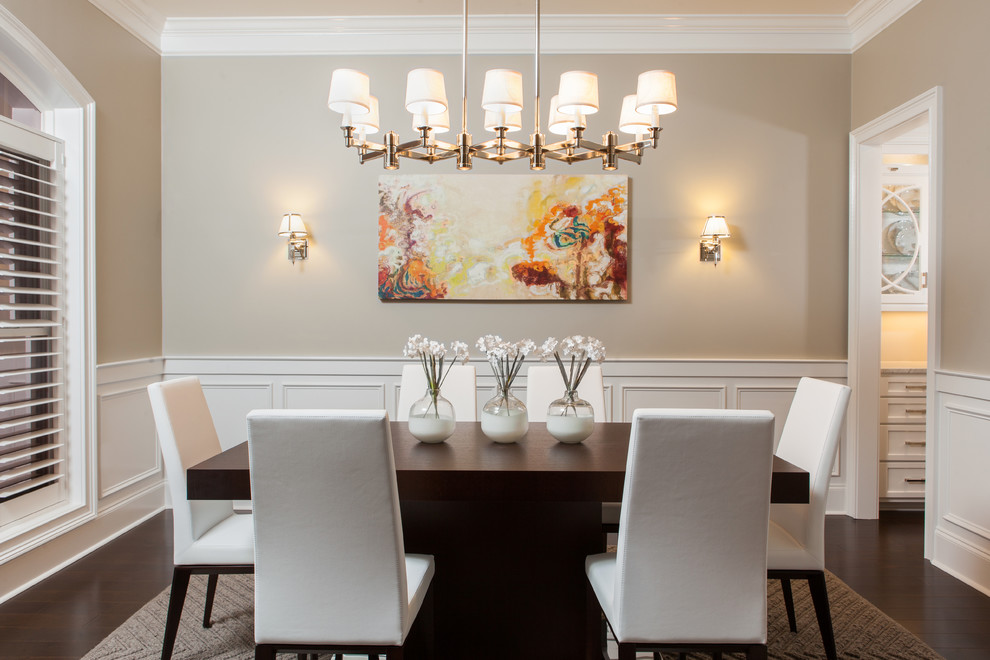 Inspiration for a traditional dining room in Charleston with beige walls.