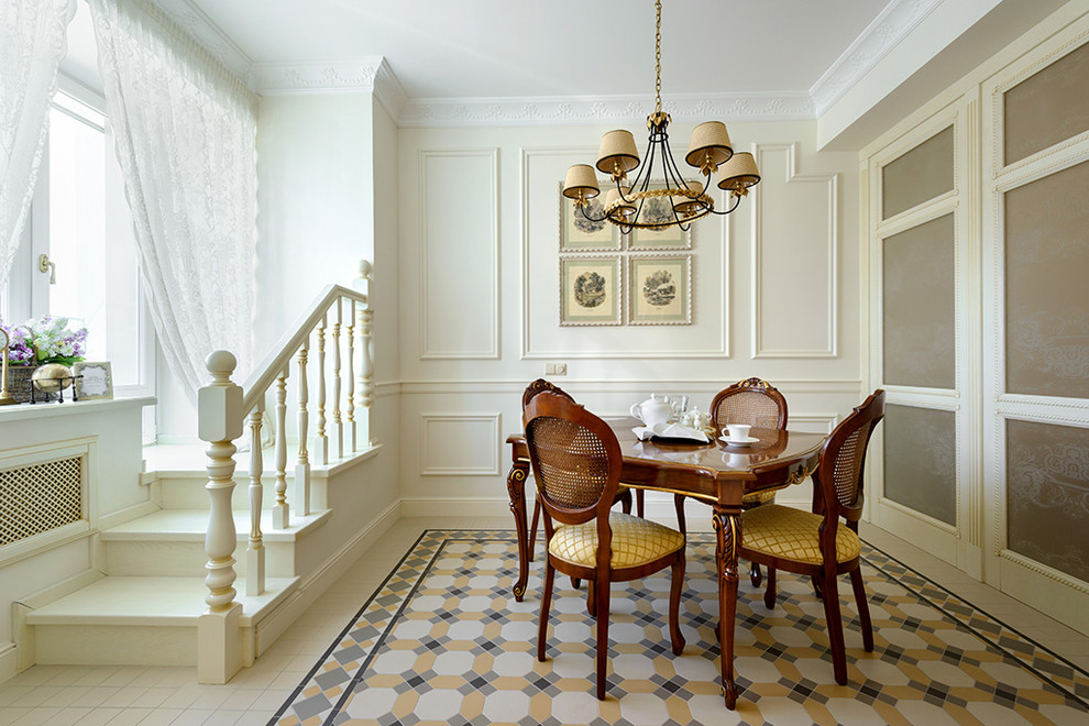 This is an example of a medium sized traditional enclosed dining room in Novosibirsk with beige walls and porcelain flooring.