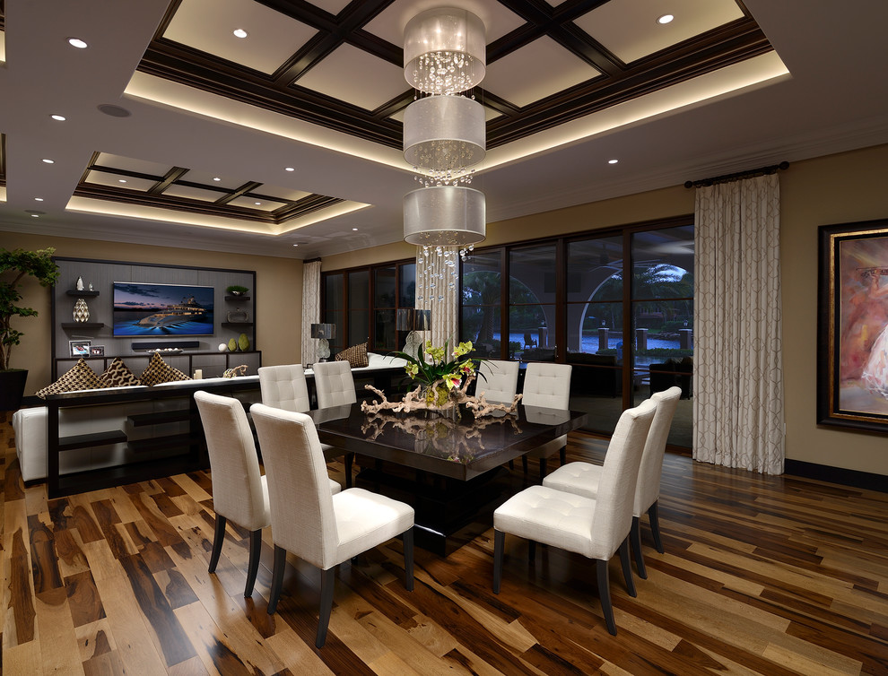 Large trendy dark wood floor great room photo in Miami with beige walls