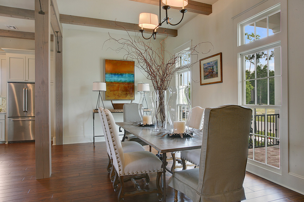 Kitchen/dining room combo - mid-sized traditional dark wood floor kitchen/dining room combo idea in New Orleans with white walls and no fireplace