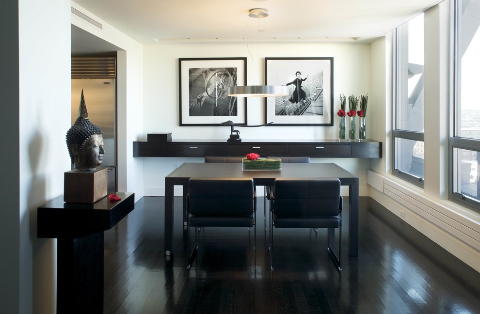 Inspiration for a medium sized contemporary enclosed dining room in Boston with white walls, black floors, dark hardwood flooring and no fireplace.