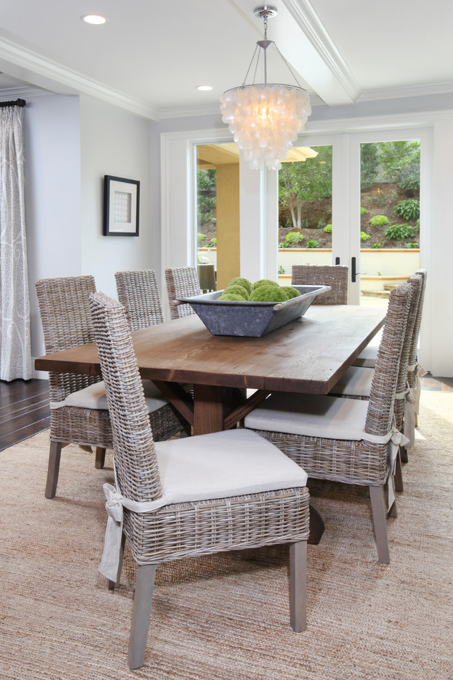 Photo of a coastal dining room in Orange County.