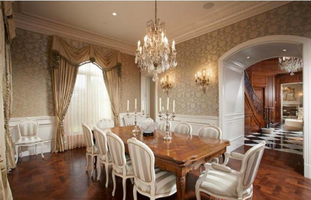 Inspiration for an expansive traditional enclosed dining room in Los Angeles with grey walls and dark hardwood flooring.