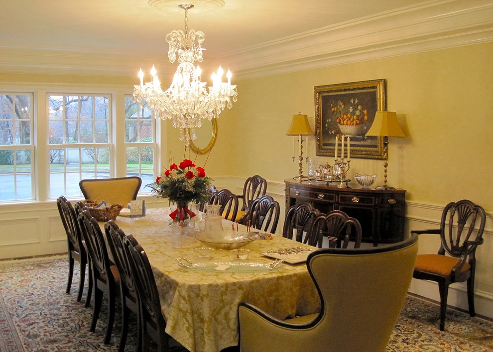 Enclosed dining room - large traditional dark wood floor and brown floor enclosed dining room idea in Boston with beige walls