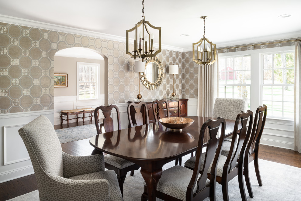 Inspiration for a large classic enclosed dining room in New York with beige walls, medium hardwood flooring and brown floors.
