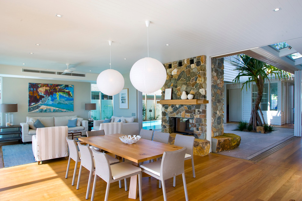 Minimalist dining room photo in Sunshine Coast