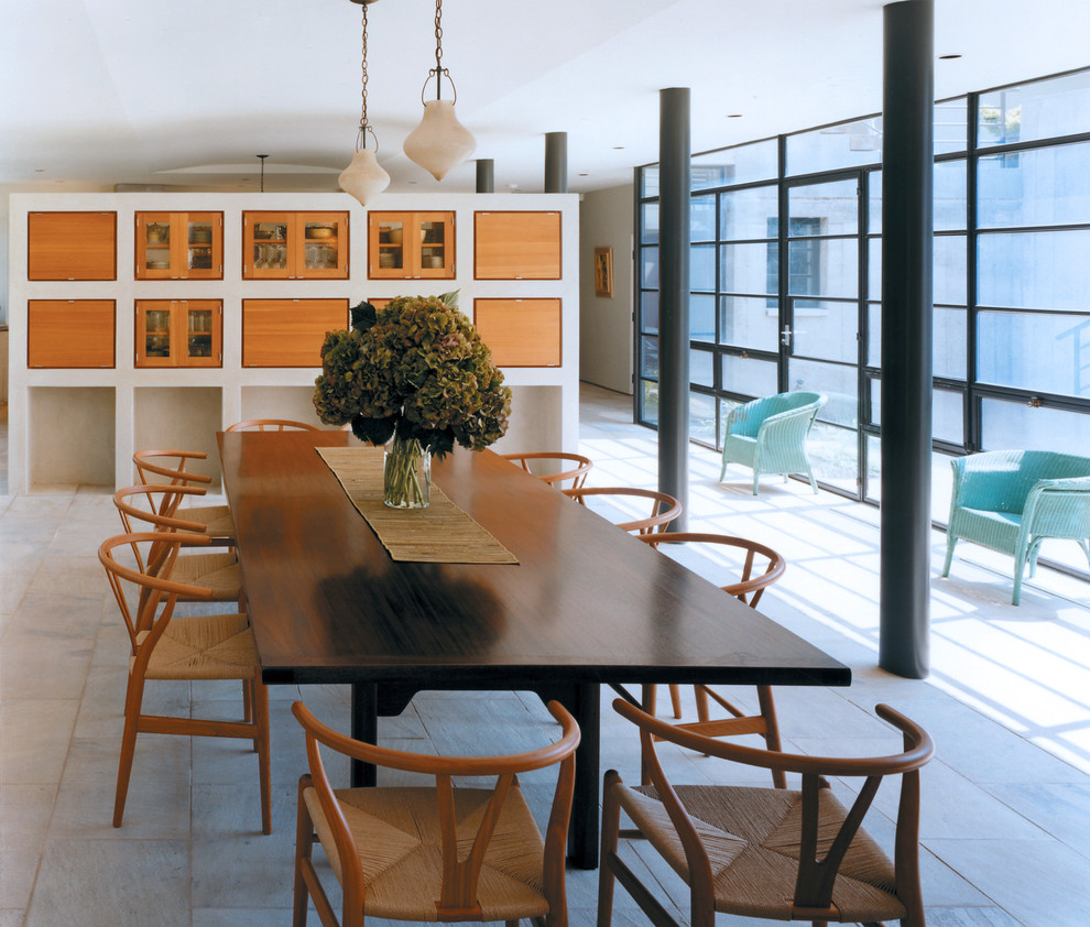 Design ideas for a large contemporary dining room in New York with white walls.