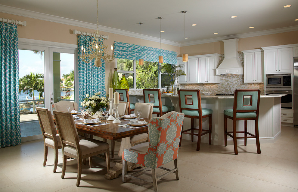 Inspiration for a timeless beige floor kitchen/dining room combo remodel in Miami with beige walls