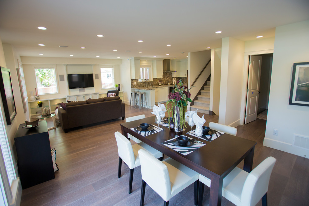 Example of a mid-sized minimalist dark wood floor enclosed dining room design in Vancouver