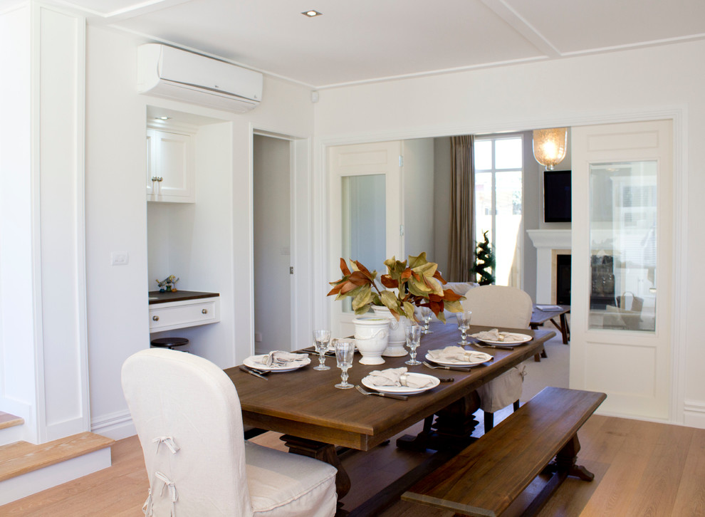 Beach style dining room photo in Auckland