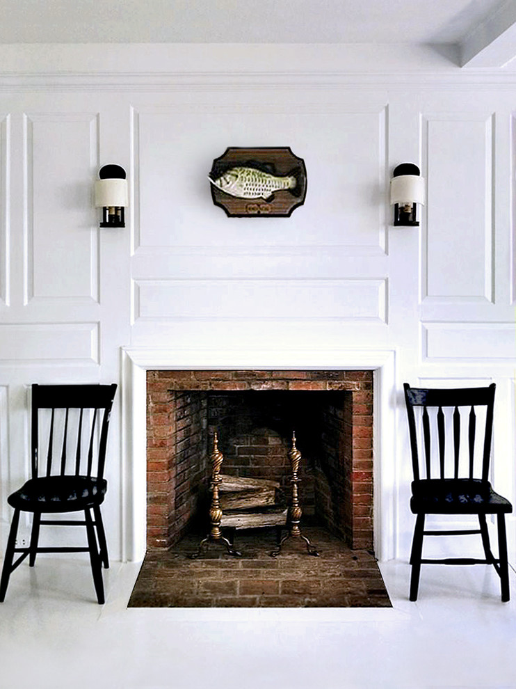 Coastal dining room in Boston with white walls.