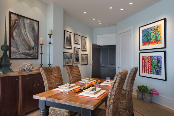 Medium sized beach style open plan dining room in Other with blue walls and light hardwood flooring.