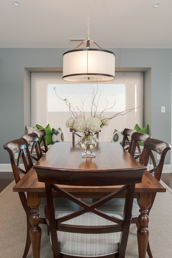 Inspiration for a large traditional open plan dining room in Wilmington with grey walls and dark hardwood flooring.