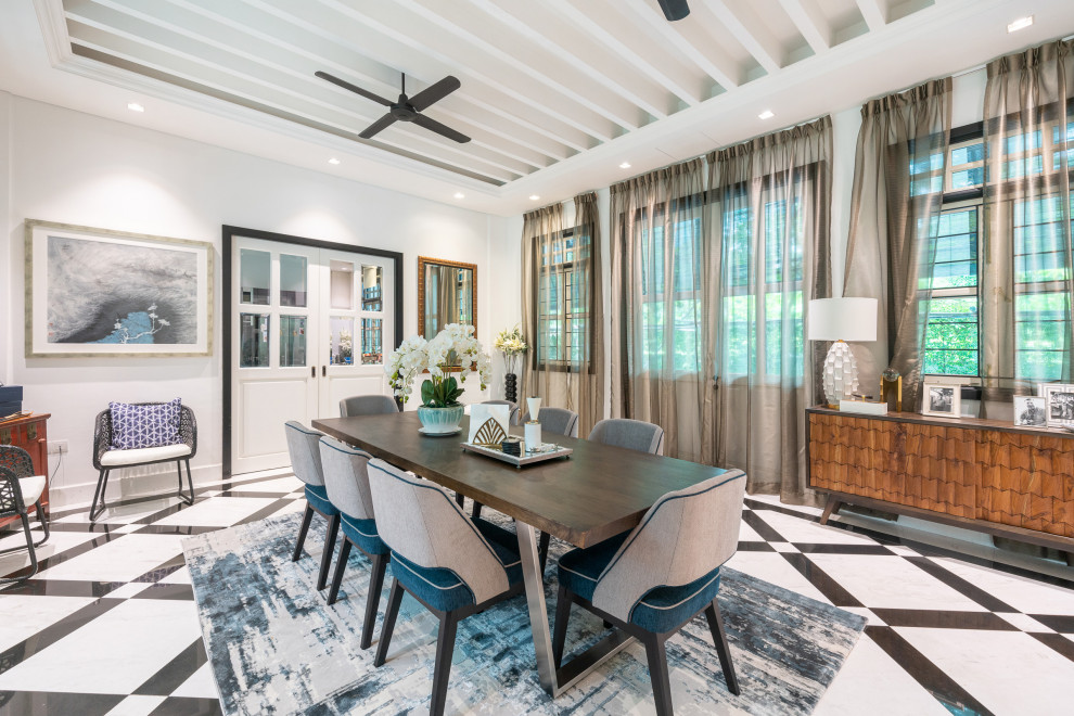 Example of a trendy multicolored floor and tray ceiling dining room design in Singapore with white walls