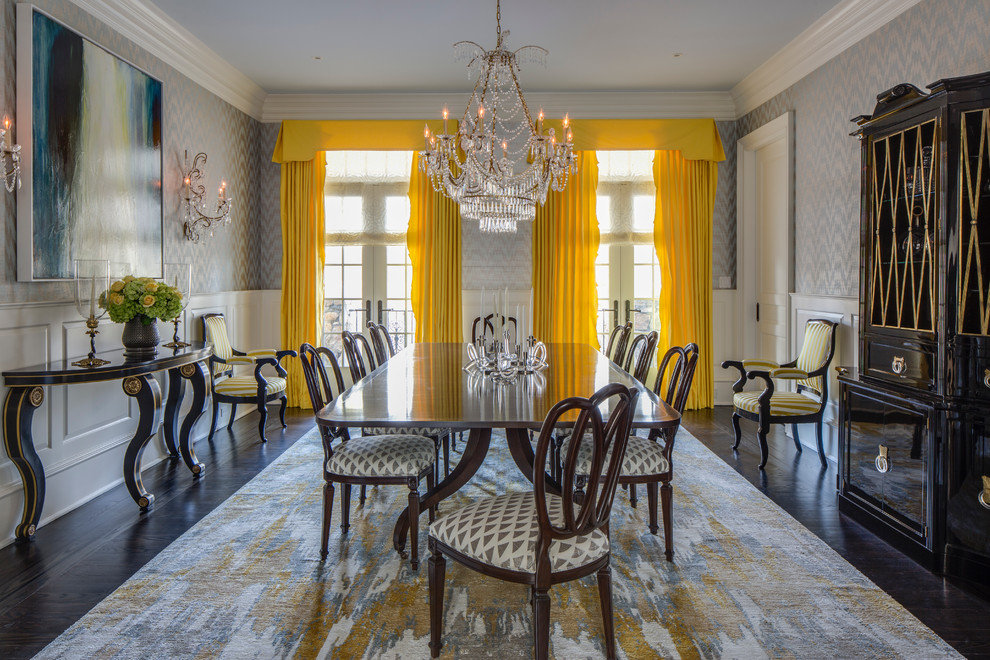 Example of a large transitional carpeted enclosed dining room design in New York with gray walls and no fireplace