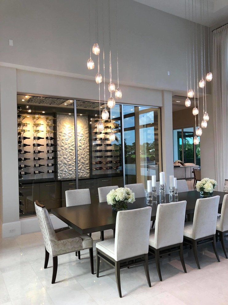 Design ideas for an expansive contemporary open plan dining room in Miami with beige walls, ceramic flooring and beige floors.