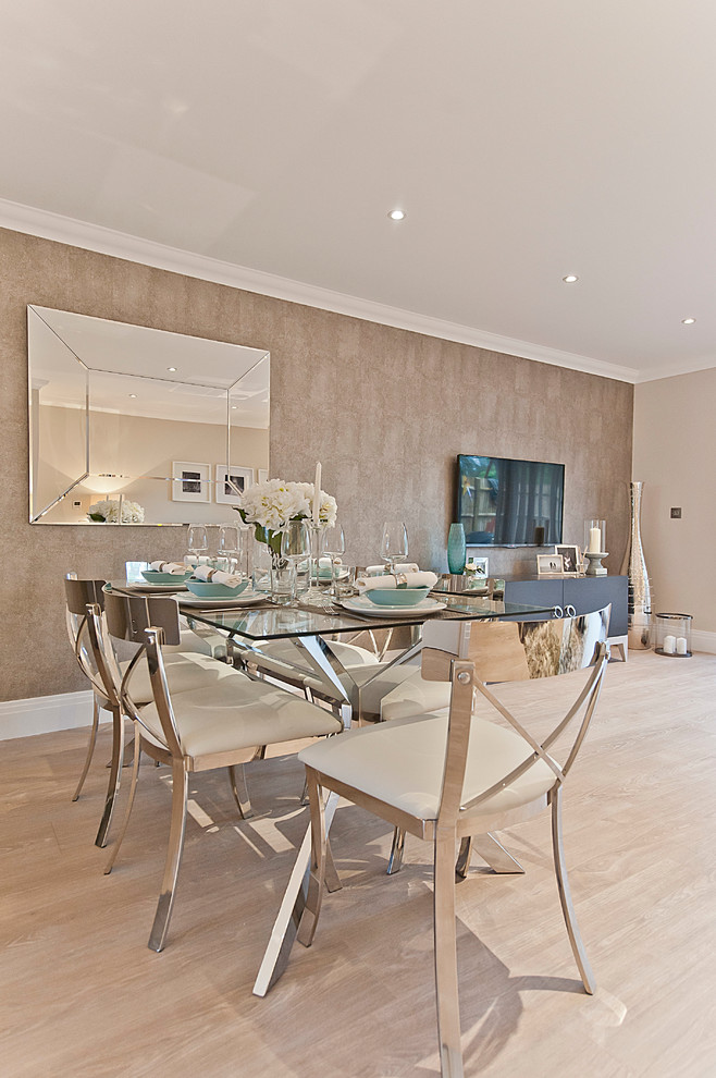 Design ideas for a contemporary dining room in Surrey.