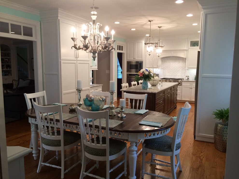 Inspiration for a medium sized eclectic kitchen/dining room in Raleigh with blue walls, light hardwood flooring and no fireplace.
