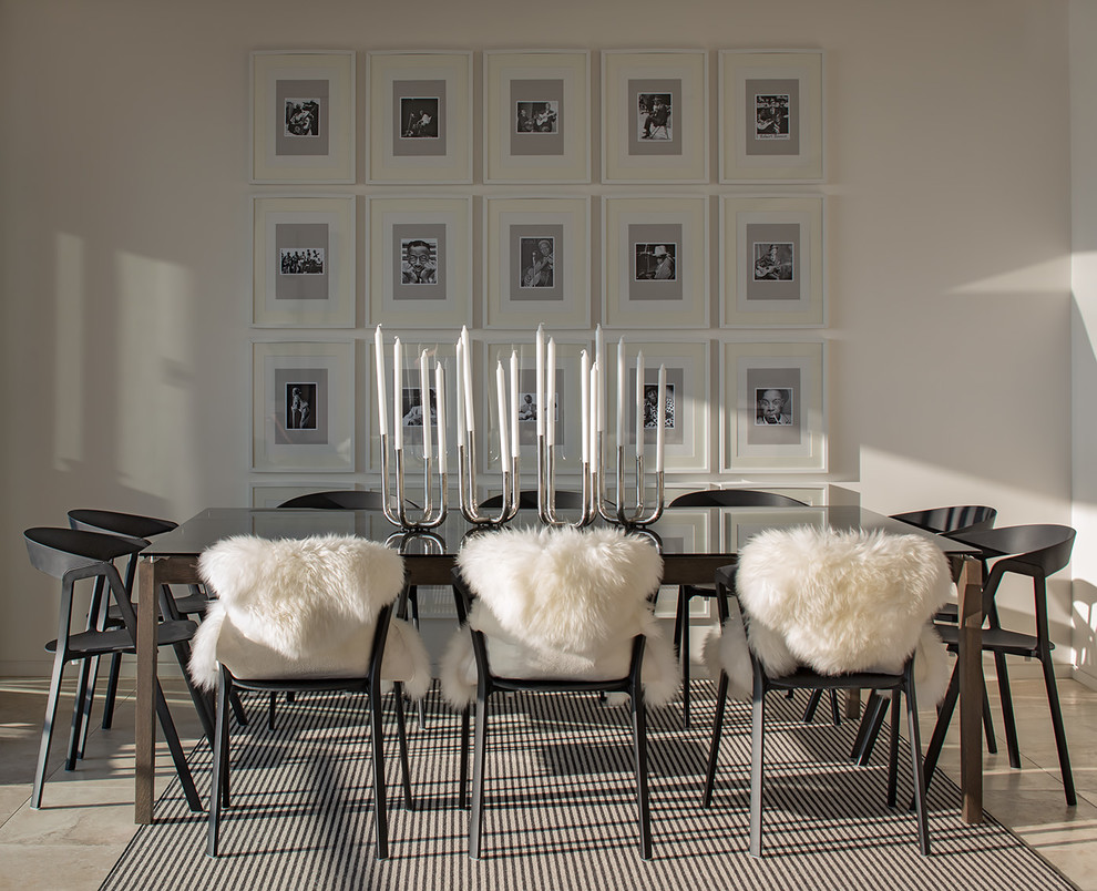 Inspiration for a mid-sized contemporary travertine floor dining room remodel in Sydney with white walls