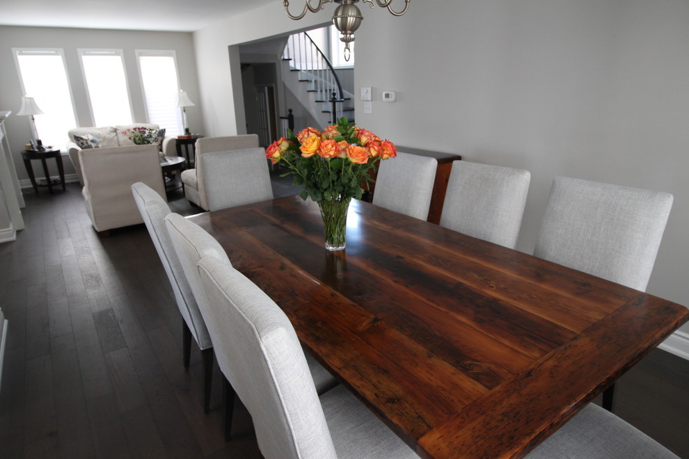 Inspiration for a contemporary medium tone wood floor dining room remodel in Toronto