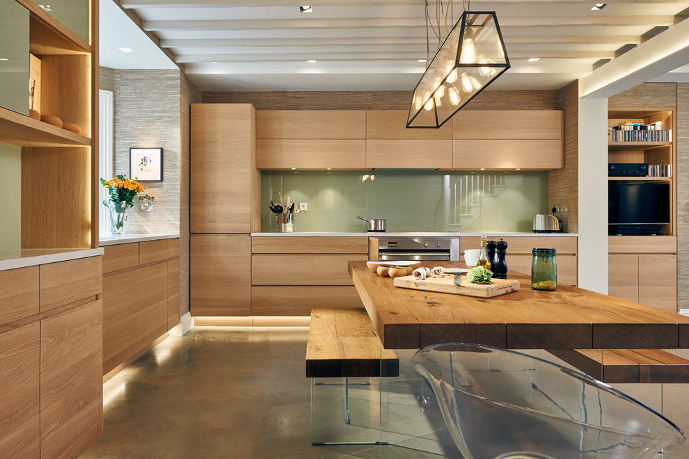 Источник вдохновения для домашнего уюта: кухня-столовая среднего размера в современном стиле с бетонным полом и серым полом