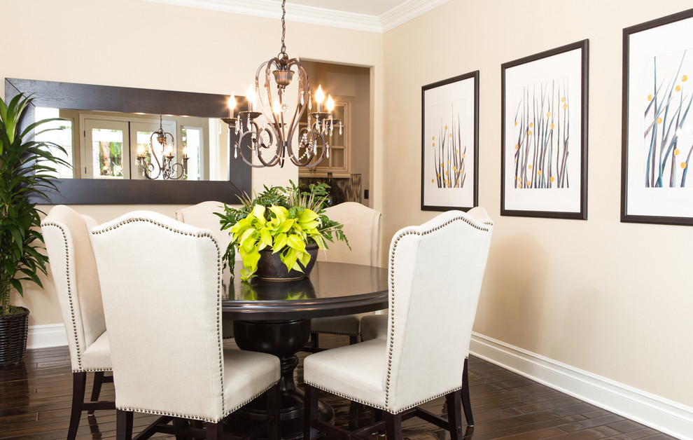 This is an example of a medium sized mediterranean enclosed dining room in Orange County with beige walls, dark hardwood flooring, no fireplace and brown floors.