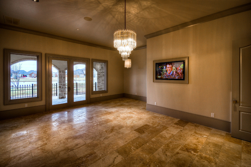 Inspiration for a large classic enclosed dining room in Austin with beige walls, travertine flooring, no fireplace and brown floors.