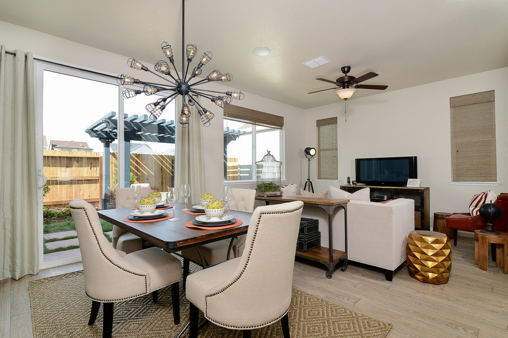 Example of a mid-sized urban porcelain tile dining room design in Sacramento with beige walls