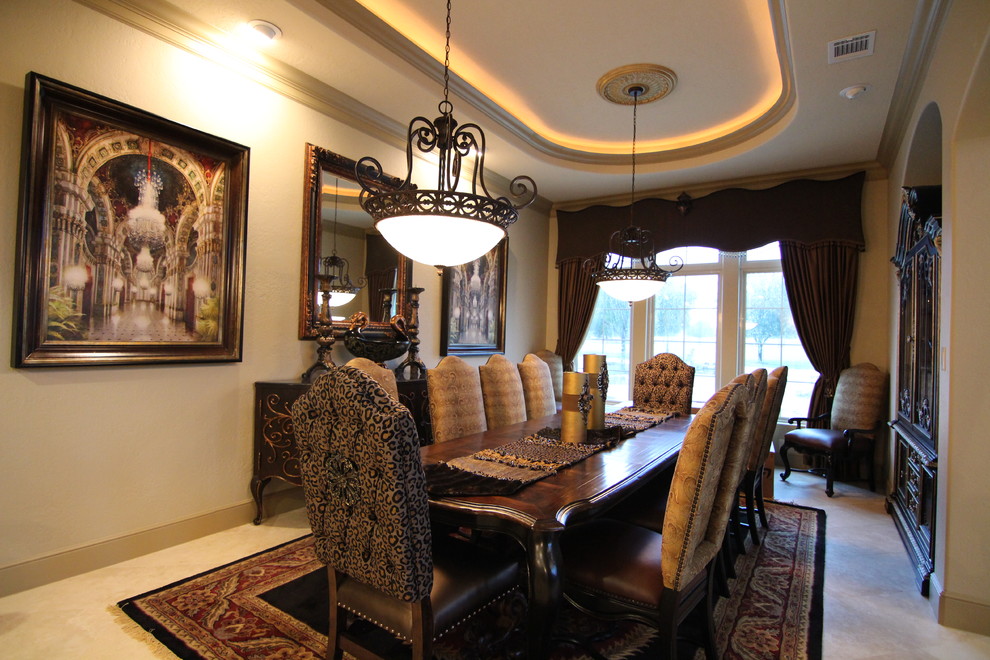 Photo of a large mediterranean enclosed dining room in Houston with beige walls and ceramic flooring.