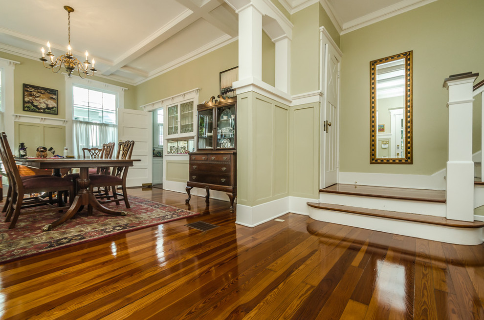 Inspiration for a large craftsman medium tone wood floor great room remodel in Tampa