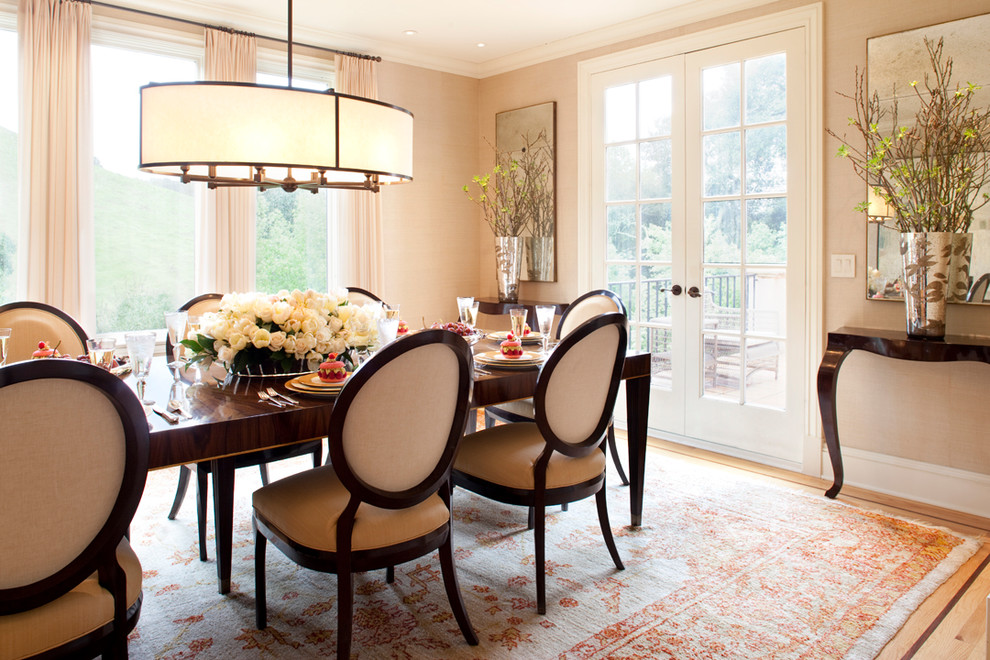 Enclosed dining room - mid-sized traditional light wood floor enclosed dining room idea in San Francisco with beige walls and no fireplace