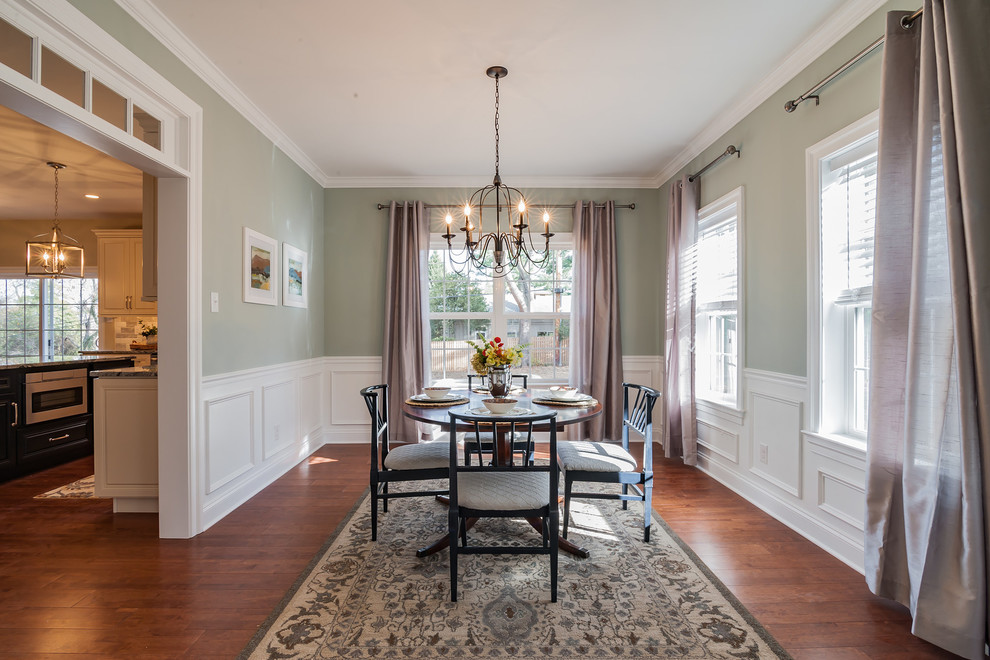 Example of a mid-sized transitional medium tone wood floor and brown floor enclosed dining room design in Philadelphia with gray walls and no fireplace