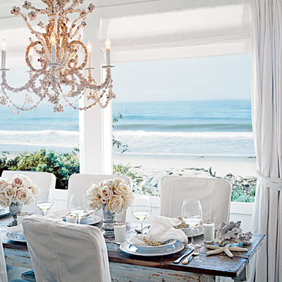Photo of a medium sized beach style enclosed dining room in Miami with grey walls and no fireplace.