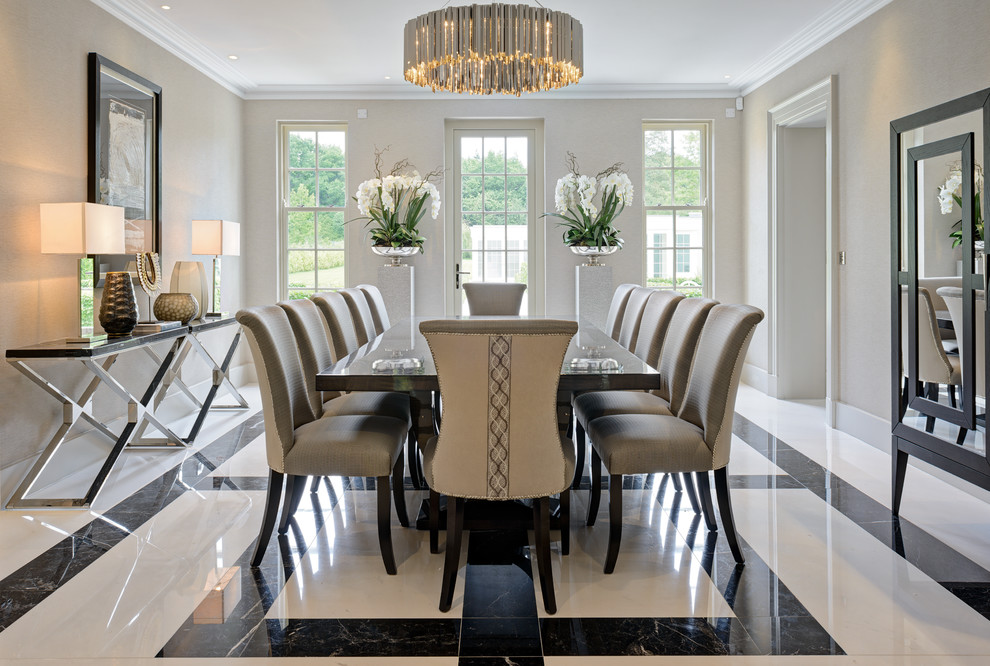 Design ideas for a classic dining room in Surrey with white walls and multi-coloured floors.
