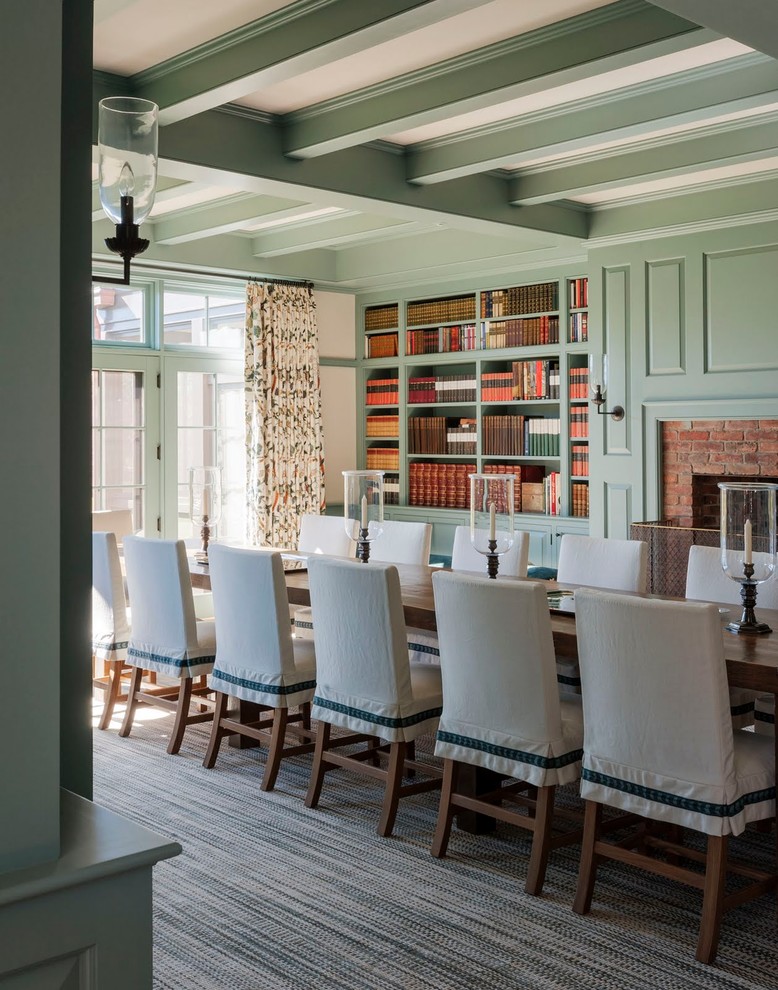 Inspiration for a huge timeless carpeted enclosed dining room remodel in Boston with green walls, a standard fireplace and a brick fireplace