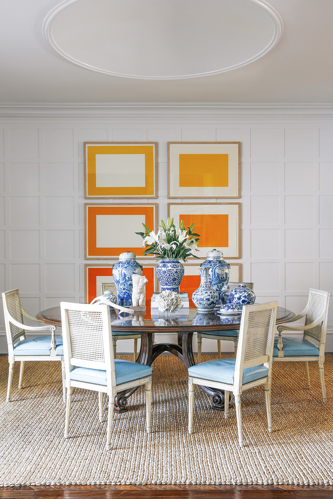 Inspiration for a nautical dining room in San Francisco with white walls and dark hardwood flooring.