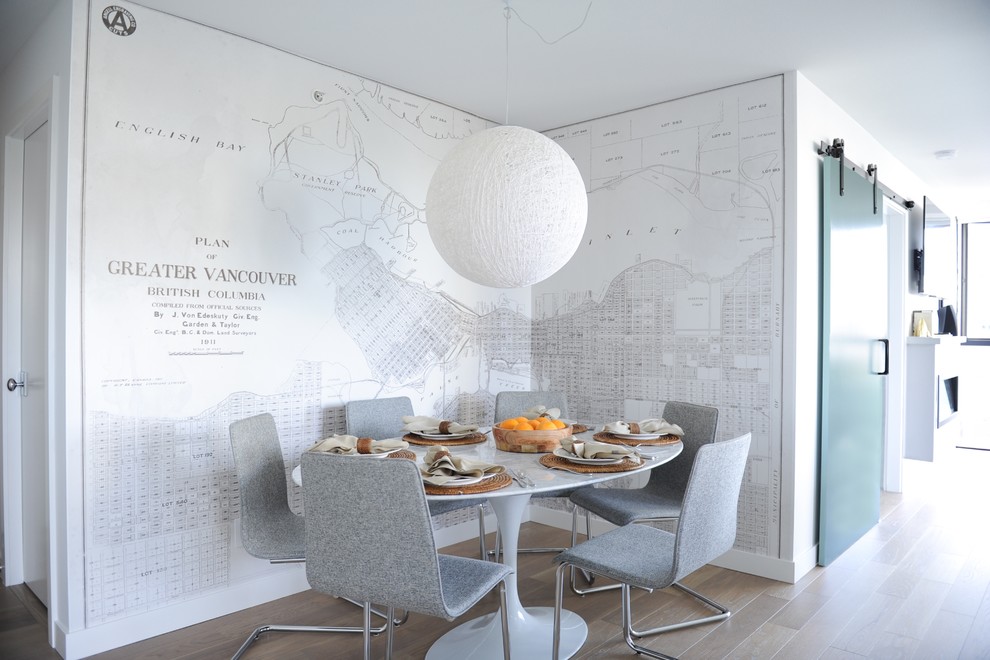 Dining room - scandinavian light wood floor dining room idea in Vancouver with multicolored walls