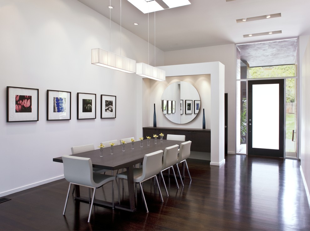 This is an example of a contemporary open plan dining room in Los Angeles.