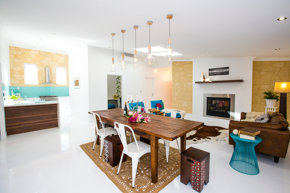 Imagen de comedor de cocina contemporáneo con paredes blancas