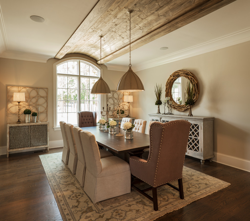Enclosed dining room - large traditional medium tone wood floor and brown floor enclosed dining room idea in Charlotte with beige walls and no fireplace