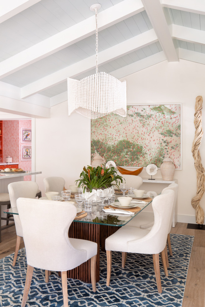 Design ideas for a coastal dining room in Miami with no fireplace and beige walls.