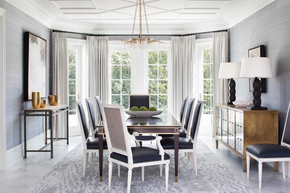 Coastal dining room in Miami with grey walls, marble flooring and no fireplace.