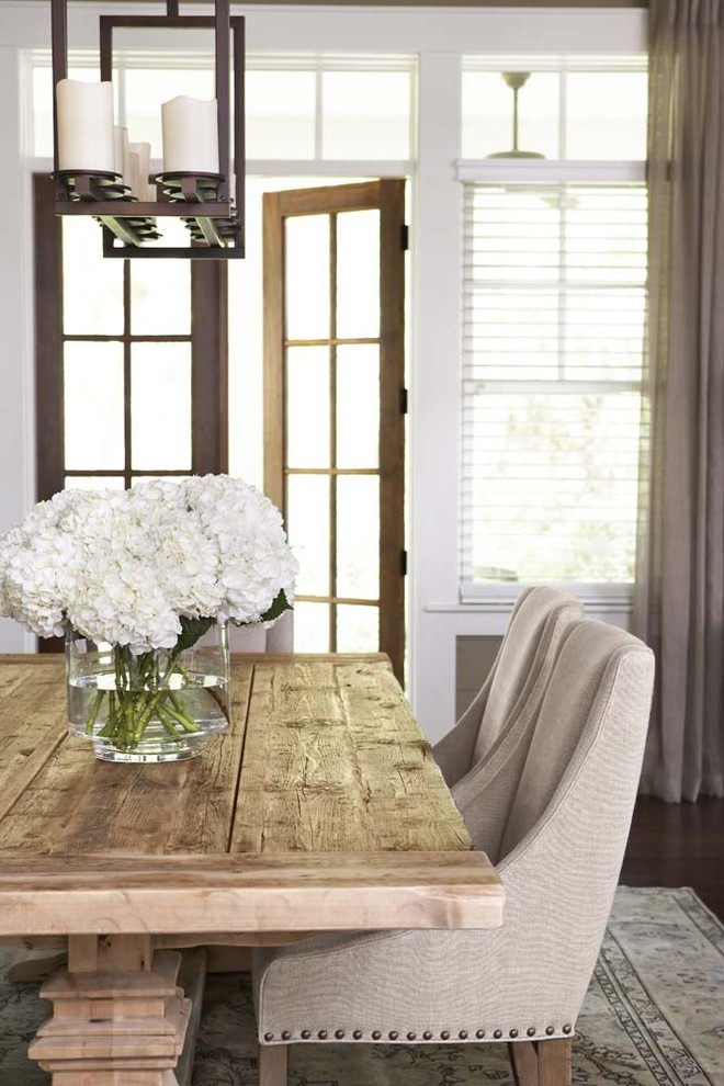 Enclosed dining room - large traditional dark wood floor enclosed dining room idea in Charleston